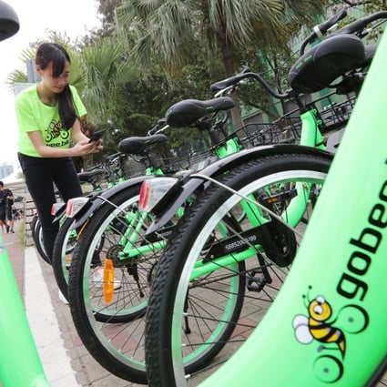 The green bicycles with the bee logo are a familiar sight in the city. Photo: Felix Wong
