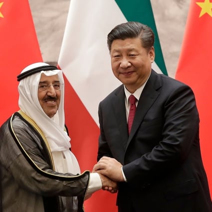 Kuwaiti Emir Sheikh Sabah Al-Ahmad Al-Jaber Al-Sabah shakes hands with Chinese President Xi Jinping after a signing ceremony at the Great Hall of the People in Beijing on Monday. Photo: AFP