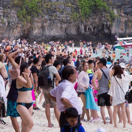 Tourists crowd Maya Bay in Thailand ahead of its closure due to overtourism on June 1.