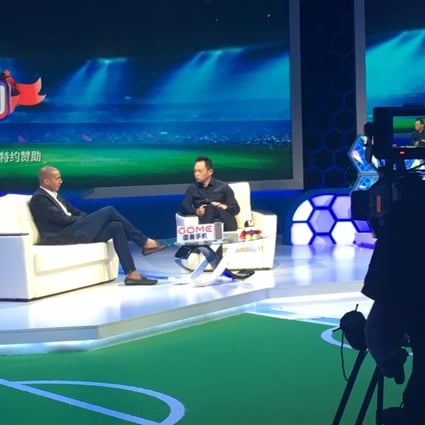 Ex-France striker David Trezeguet talks to Su Dong in the Tencent studio. Photo: Michael Church
