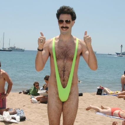 Sacha Baron Cohen as chauvinistic Kazakh reporter Borat Sagdiyev in a highlighter-green mankini that, once seen, could never be unseen.
