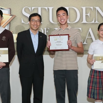 Mah Shao-qian, third from left, won in March the Scientist and Mathematician category of the South China Morning Post’s annual Student of the Year Awards, sponsored by The Hong Kong Jockey Club. He is flanked, from left, by second runner-up Wong Man-ho, Hong Kong Science and Technology Parks Corp chief executive Albert Wong Hak-keung, and first runner-up Cheng Nga-ting. Photo: Handout