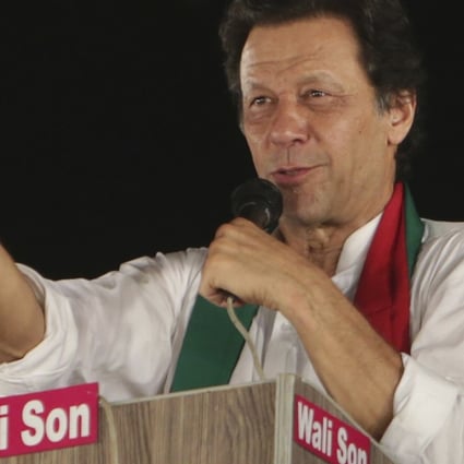 Pakistani politician Imran Khan, chief of the Pakistan Tehreek-e-Insaf party, addresses supporters during an election campaign in Lahore, Pakistan. Photo: AP