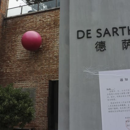 A notice of demolition is posted at the entrance of the de Sarthe Gallery in Beijing's Caochangdi art district. Galleries have been given two weeks to move out. Photo: Simon Song