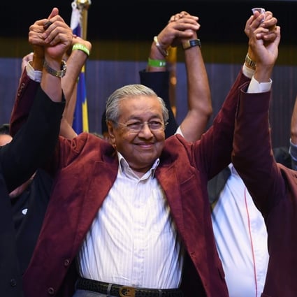 Malaysian Prime Minister Mahathir Mohamad celebrates his election win in Kuala Lumpur. Photo: AFP