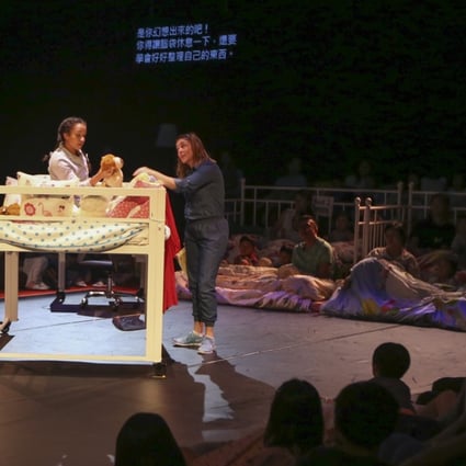 A scene from theatre show Bedtime Stories, with young audience members watching from the side of the stage at the Hong Kong Cultural Centre. Photo: Xiaomei Chen