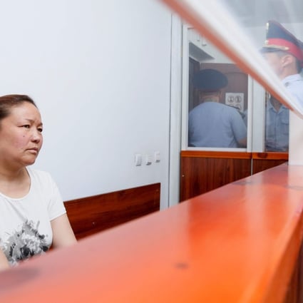 In this file photo taken on July 13, Sayragul Sauytbay attends a court hearing in Zharkent, accused of illegally crossing the border with China to join her family in Kazakhstan. Photo: Agence France-Presse