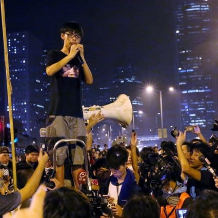 Joshua Wong delivers a speech outside the chief executive's office in Admiralty during the Occupy movement in 2014. Photo: SCMP