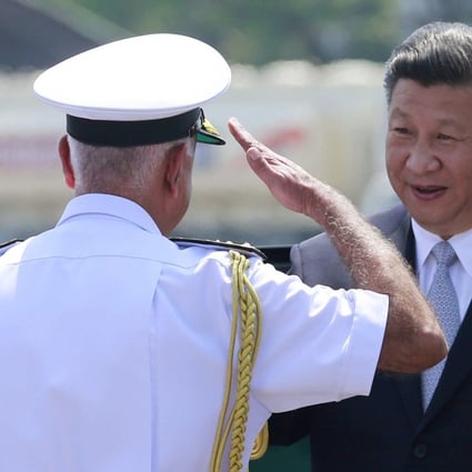 An Indian naval officer salutes Chinese President Xi Jinping upon his arrival in Goa, India in October 2016. Unlike at the land border between them, China and India’s interactions at sea have not been tense thus far, but this may not last. Photo: AP