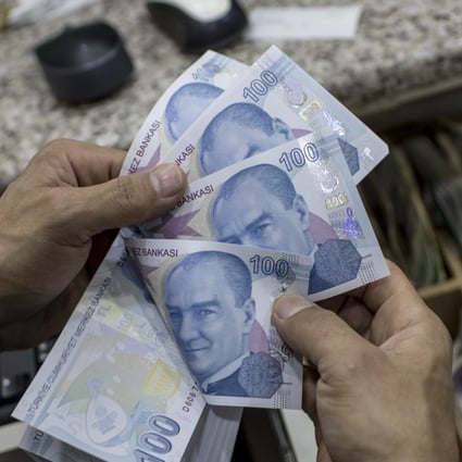 The Turkish lira stabilised against the US dollar on Tuesday after posting an all-time low on Monday. Photo: EPA