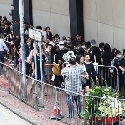Nearly a thousand mourners show up for funeral service of Hong Kong