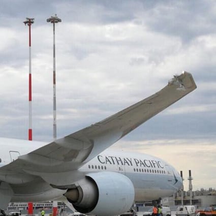 A Cathay Pacific Boeing 777 was towed into a light pole in Rome, damaging the wing tip. Photo: Rome Aviation Spotters Facebook page