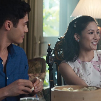 Henry Golding (left) as Nick Young and Constance Wu as Rachel Chu in a still from Crazy Rich Asians.