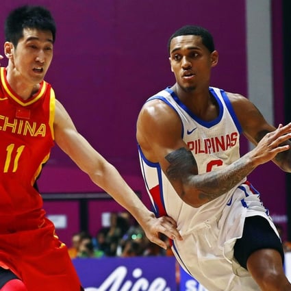 Jordan Clarkson takes on Liu Zhixuan on Tuesday. Photo: EPA