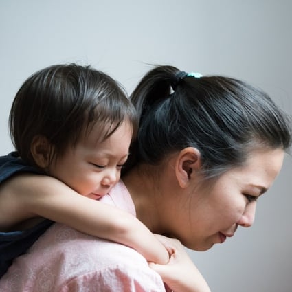 mother and daughter. Mother holding daughter on her back. Photo: Shutterstock