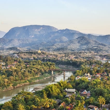 Nam Khan River and Luang Prabang. Laos is facing increasing tourist numbers from the upcoming Laos-China Railway. Photo: Alamy