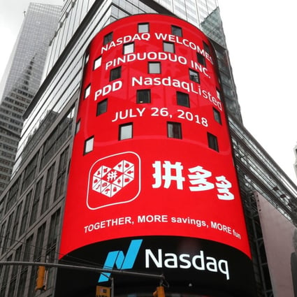 A display at the Nasdaq Market Site shows a message after Chinese online group discounter Pinduoduo Inc. (PDD) was listed on the Nasdaq exchange in Times Square in New York City, New York, US, July 26, 2018. REUTERS/Mike Segar