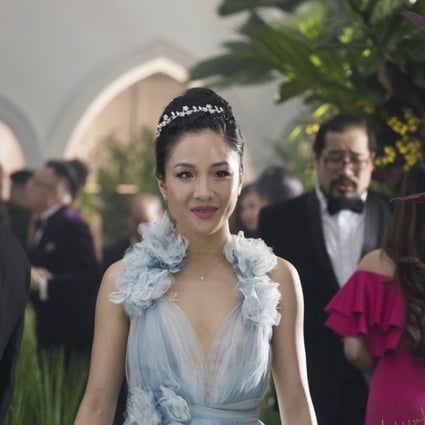 Crazy Rich Asians is about a young woman (Constance Wu) being initiated into Singapore high society. Photo: AP
