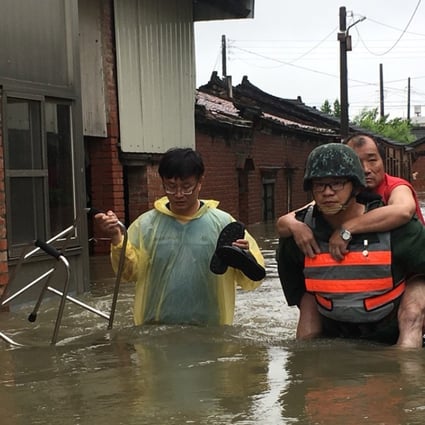 The Taiwanese army helped to evacuate residents in Chiayi county after torrential rain in central and southern Taiwan since Thursday. Photo: CNA