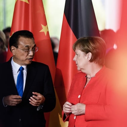 Li Keqiang with Angela Merkel. Photo: EPA