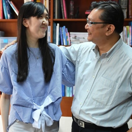 Marfan syndrome sufferer Lai Sai-yu (left), 16 – who has undergone heart surgery at the Hong Kong Adventist Hospital – Stubbs Road to improve her condition – with her father, Lai Chi-leung, who was told soon after her birth that she may not live long. Photo: Ali Ghorbani