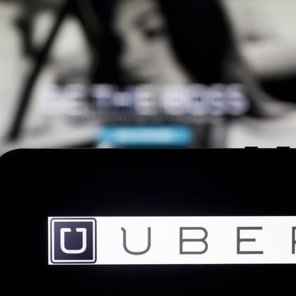 Uber’s ride-sharing services are banned in Japan, though its taxi-hailing technology has given it a foothold in the market. Photo: Bloomberg