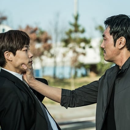 Cho Jin-woong gets to grips with Ryu Jun-yeol in a scene from Believer (category: IIB; Korean), directed by Lee Hae-yeong and also starring Kim Joo-hyuk.