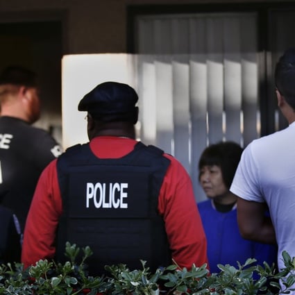 Police investigate a complex in California suspected of being a “maternity hotel”, where Chinese women board to give birth on American soil, in 2015. Picture: Mark Boster / Los Angeles Times