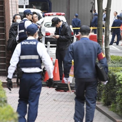 File photo of police investigating the scene of a possible robbery in Fukuoka, Japan. Photo: Kyodo