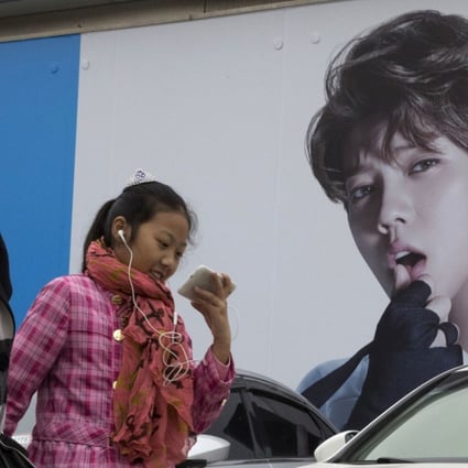 QQ, the grandaddy of China’s social media scene, is reaping the rewards of introducing features that appeal to the country’s Generation Z. Photo: AP.