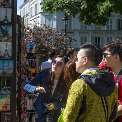 In France, the average Chinese tourist spent 11,386 yuan (US$1,667) with Alipay, almost four times than the average. Photo: AFP