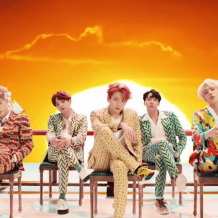 The seven members of K-pop boy band BTS in a still from the second Idol music video, which received more than 10 million views in less than 24 hours.