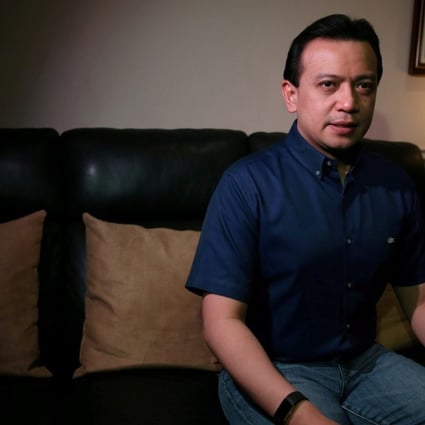 Philippine Senator Antonio Trillanes sitting on the sofa he is sleeping on in his office at the Senate in Pasay City, Metro Manila on September 7, 2018. Photo: Reuters