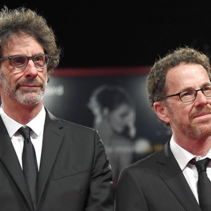 Joel (left) and Ethan Coen arrive for the premiere of The Ballad of Buster Scruggs at the Venice International Film Festival. Their film, a Western anthology, won best screenplay. Photo: EPA-EFE