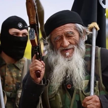 Muhammed Amin, 80-year-old Islamic State fighter, and reportedly a member of China’s Uygur minority, is seen with another IS member in Syria, in this image from a 2015 propaganda video. Photo: Handout
