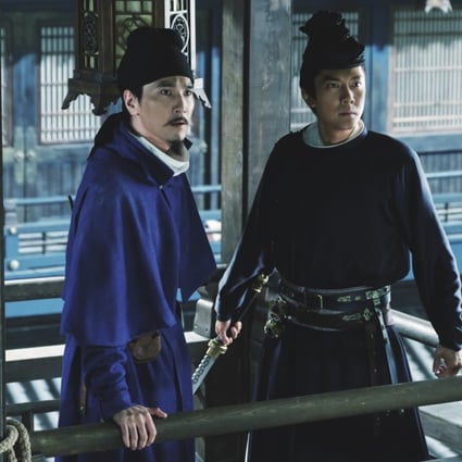 Mark Chao and Feng Shaofeng in a scene from Detective Dee: The Four Heavenly Kings (category IIB, Mandarin), directed by Tsui Hark and co-starring Carina Lau.
