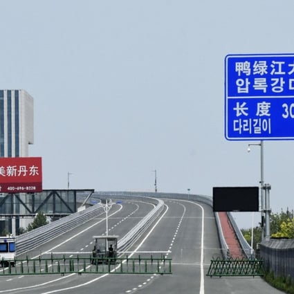A new bridge over the Yalu River links the Chinese border city of Dandong, Liaoning province, and the North Korean county of Ryongchon. Photo: Kyodo