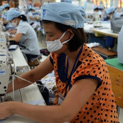 A production line at a garments factory in the outskirts of Hanoi, Vietnam. Trade agreements’ labour provisions remain largely cosmetic, with little practical effect. Photo: AFP