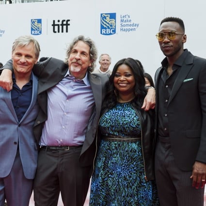 Viggo Mortensen (left), director Peter Farrelly, Octavia Spencer and Mahershala Ali pose on the red carpet before the screening of Green Book at the Toronto International Film Festival. Photo: Christopher Katsarov/The Canadian Press/AP