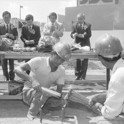 A start-work ritual on 7 January, 1991 at the operational headquarters of Towngas in North Point. Yu Ling-sun, managing director of Hsin Chong (Foundations) Ltd, the contractor of the HK$300-million, 25-storey building, is on the far right of the photograph. Photo SCMP
