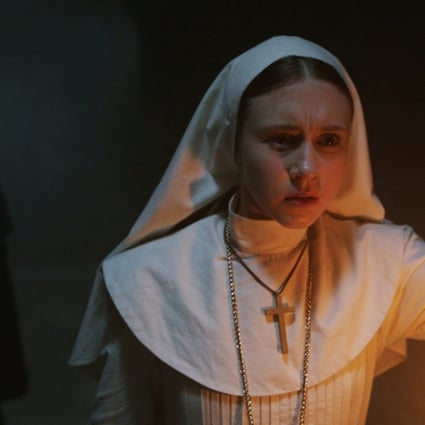Taissa Farmiga in a scene from The Nun (category IIB), directed by Corin Hardy, and co-starring Demián Bichir. Photo: Courtesy of Warner Bros. Pictures