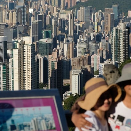 The Hong Kong skyline as seen from Victoria Peak. Demand for co-working facilities in the city mushroomed to 1.2 million sq ft in the five months to May, according to CBRE. Photo: Fung Chang