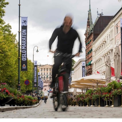 A cyclist at Karl Johans gate in Oslo. Determined to go green, Oslo is slowly but surely ridding its city centre of motorists. Photo: AFP