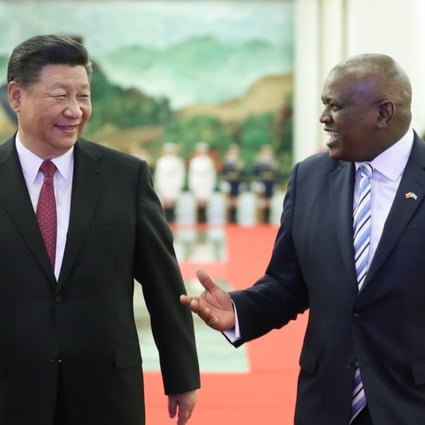 Chinese President Xi Jinping (left) shares a light moment with Botswana’s President Mokgweetsi Masisi before their talks at the Great Hall of the People in Beijing on August 31. Photo: Xinhua