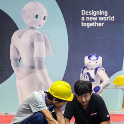 A promise to build a new world together at the World Robot Conference in Beijing. Robotics is one of the areas China has targeted in its Made in China 2025" industrial master plan, which aims at controlling the domestic market in a series of hi-tech areas, much to the annoyance of the US. Photo: AP