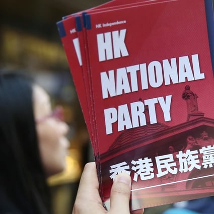Members of the Hong Kong National Party hand out leaflets to the public. Photo: Sam Tsang