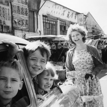 Sarah Driver, then Whitehead, and her brothers in Stanley Market. Picture: Sarah Driver