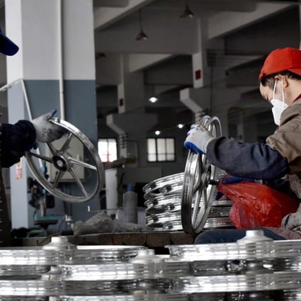 Both official and private surveys suggested the economy cooled in September. Photo: AFP