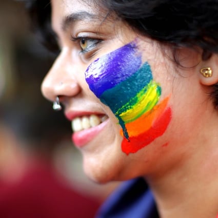 An LGBTI activist celebrates India’s overturning of a law criminalising gay sex. The Indian court’s verdict has inspired campaigners seeking a similar move in Singapore. Photo: EPA