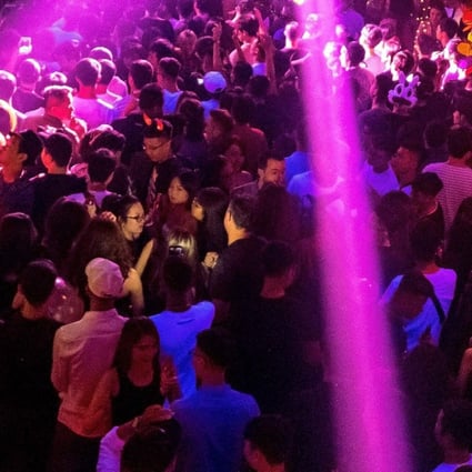 Vietnamese revellers dance at a nightclub in Hanoi, days after seven people died from a toxic cocktail of drugs at a dance festival in the city. Photo: AFP